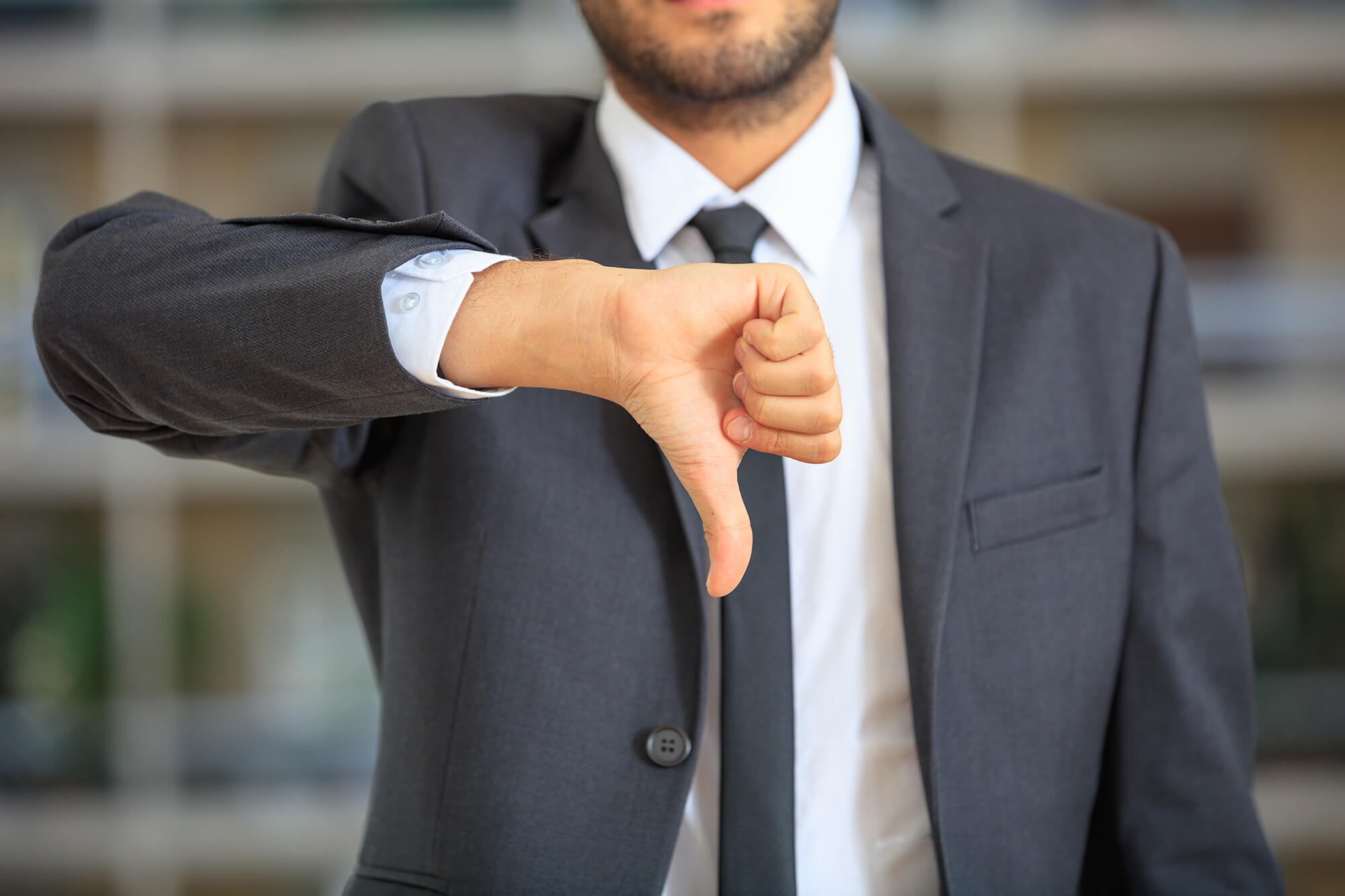 man doing a disapprove sign